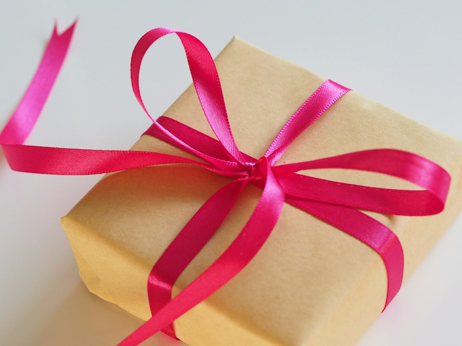 Hands receiving a curated gift box